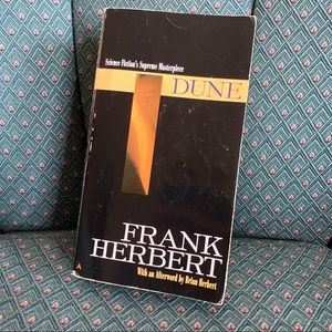 Dune Paperback Novel by Frank Herbert. Science Fictions Supreme Masterpiece!